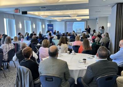 Back of the room photo of attendees 
